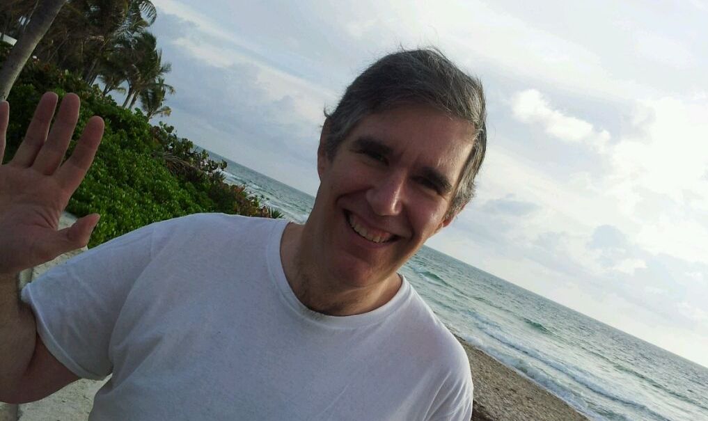 Photograph of John Michael Pierobon on the Fort Lauderdale beach.